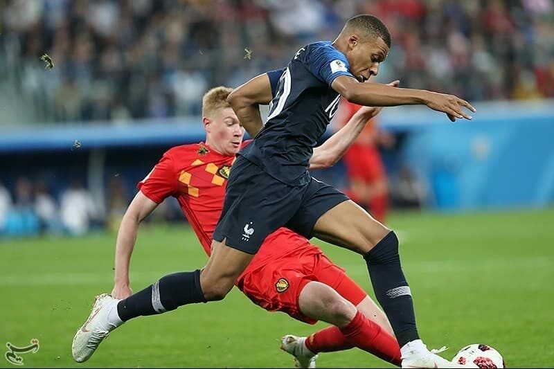 Kylian Mbappe — France's Captain dribbling the football.
