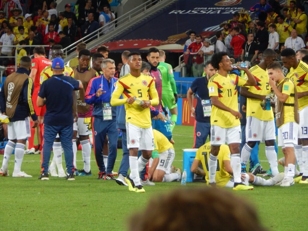 Colombia national football team players line up before an international match.