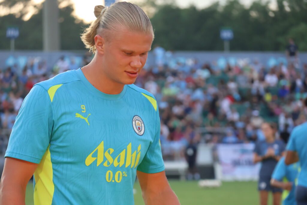 Erling Haaland celebrating a major football trophy