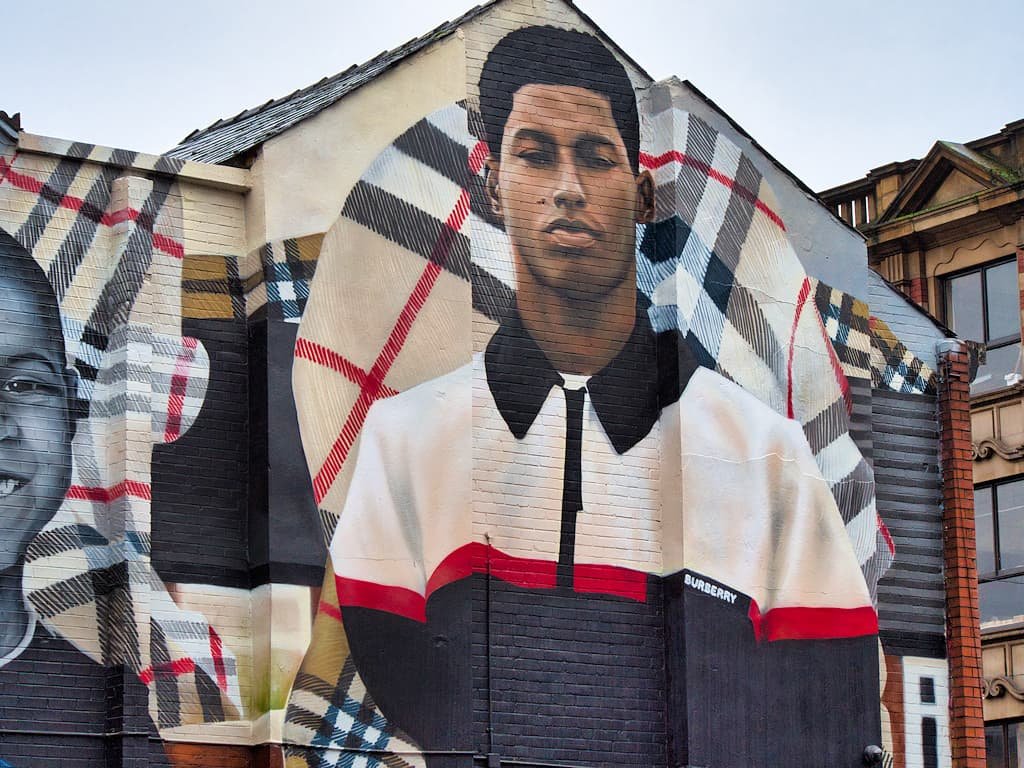 people proudly advertised Marcus Photo onto their house wall.