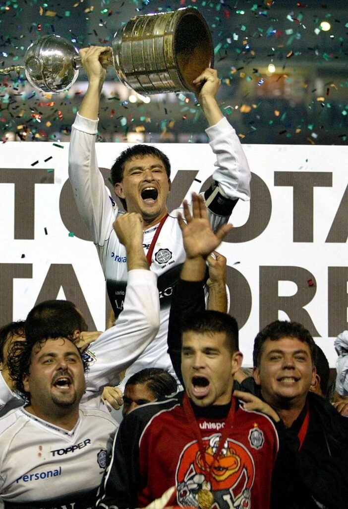 Julio Enciso playing for Paraguay in a competitive football match.