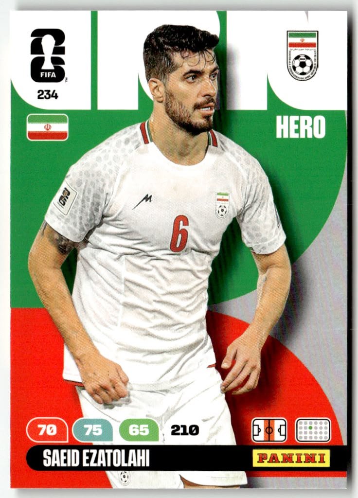 Saeid Ezatolahi challenging for the ball in an international football match.