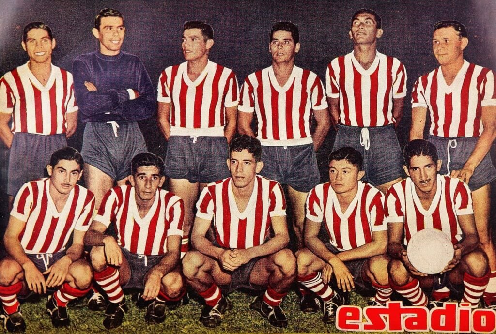 Paraguay players celebrating a historic achievement in international football.
