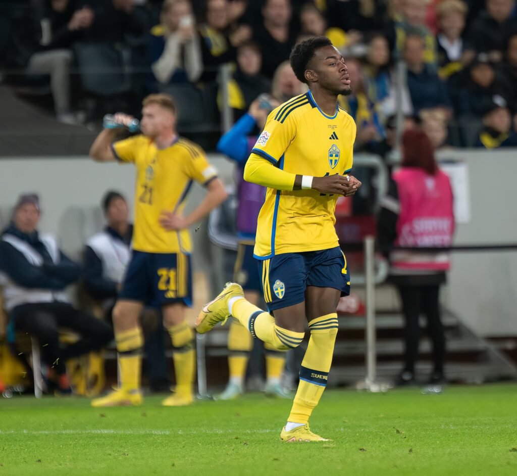 Anthony Elanga dribbles past a defender for Sweden.