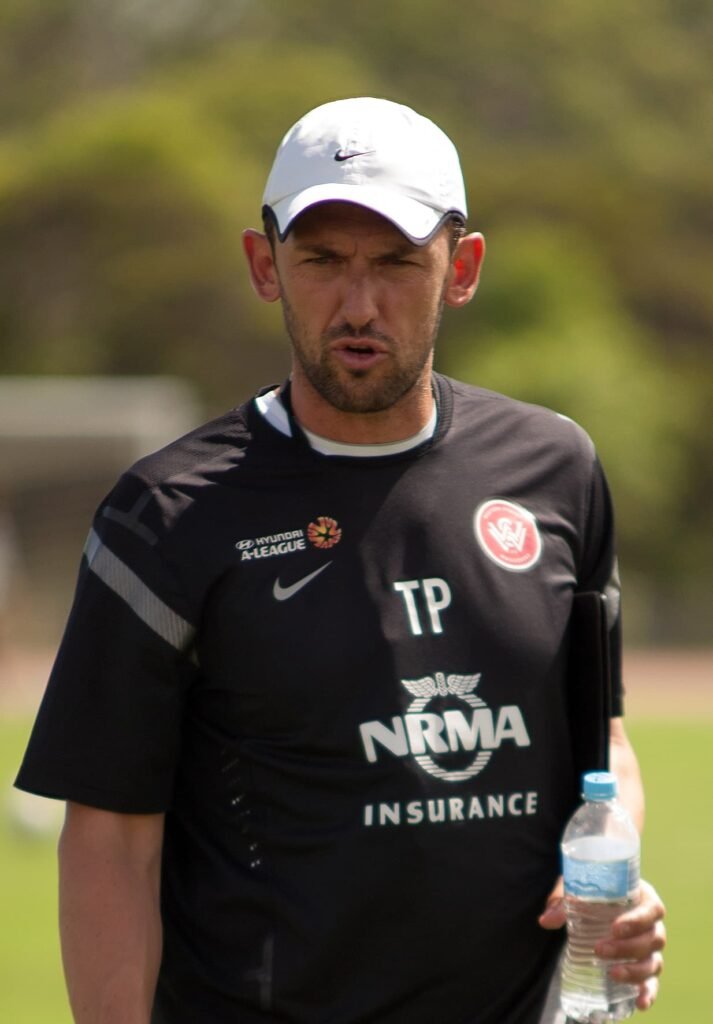 Tony Popovic gives instructions from the touchline.